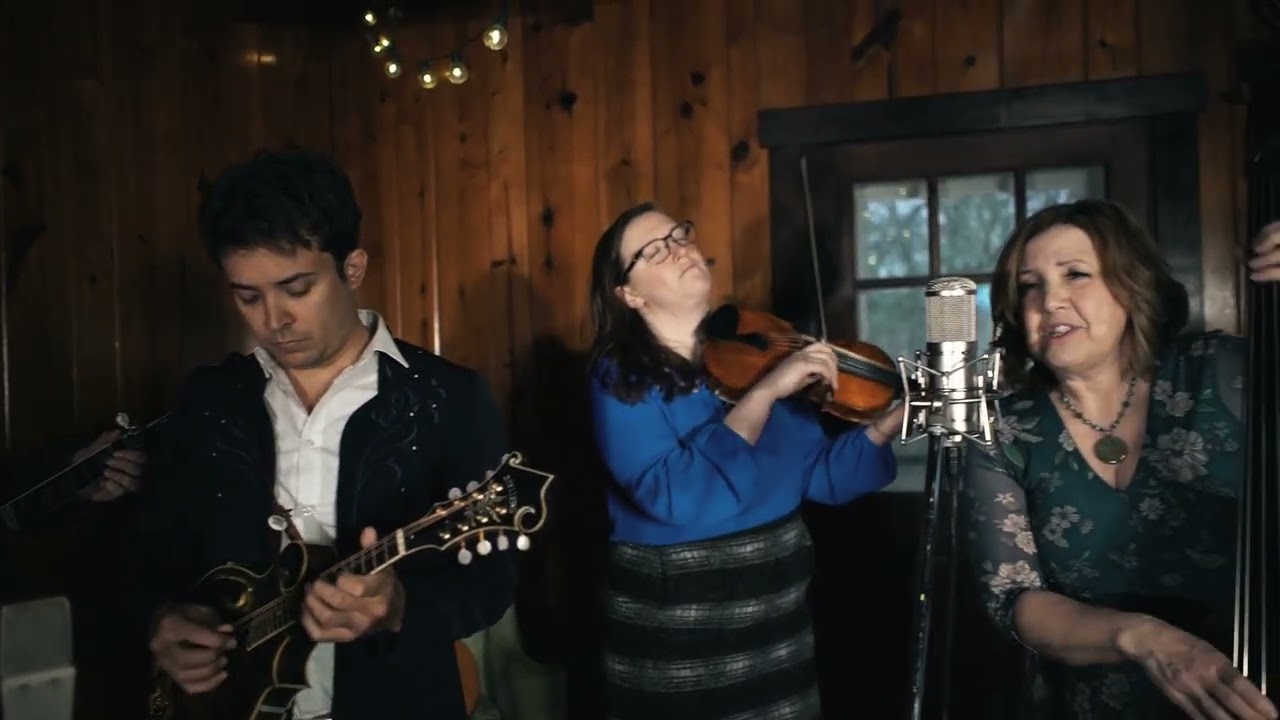 People in a band performing
