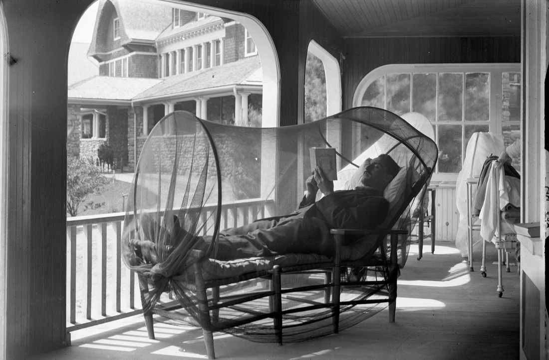 man curing in netted cure chair orig