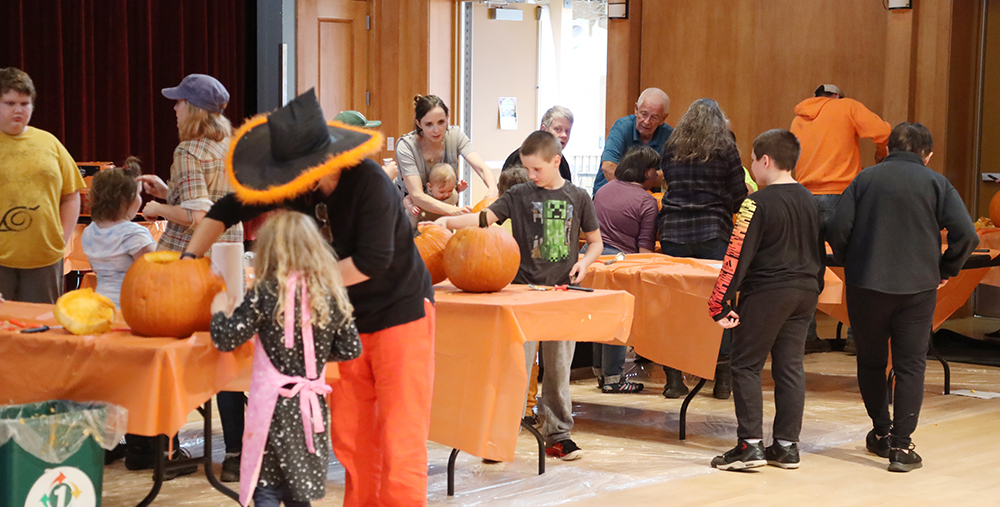 The tables were full at the 2022 CAA Pumpkin Carving Event sm